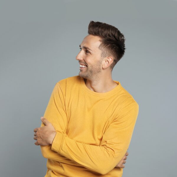 Mid fade with a quiff