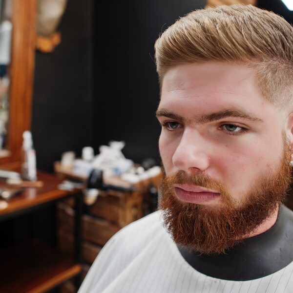 High textured top with a fade and beard